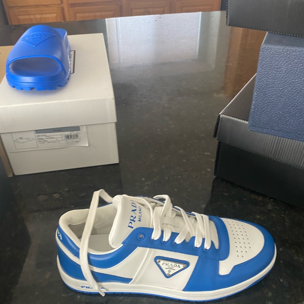 Prada Downtown leather sneakers and soft slides